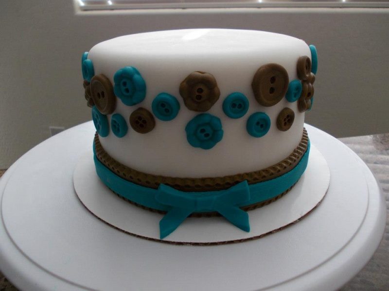 Brown and Blue Buttons Baby Shower Cake